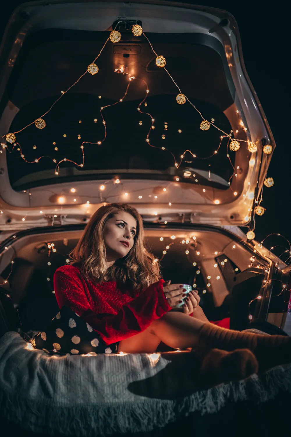 woman sitting in the back seat of a car wallpaper