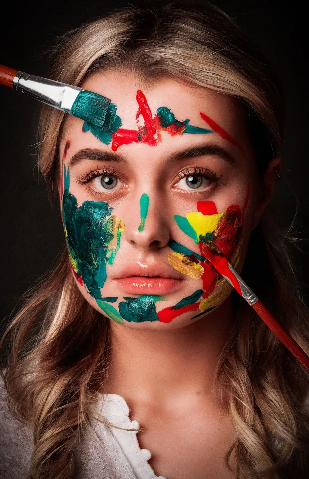 thumb for Woman With Red Green And Yellow Face Paint Wallpaper